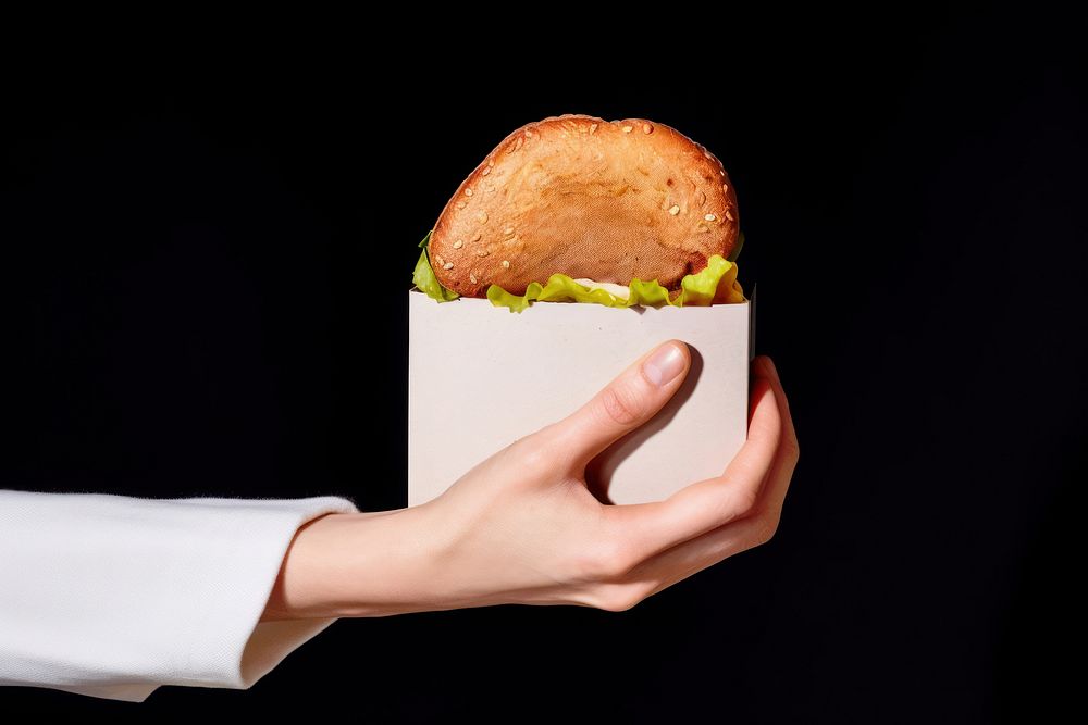 Holding burger bread food hand. 