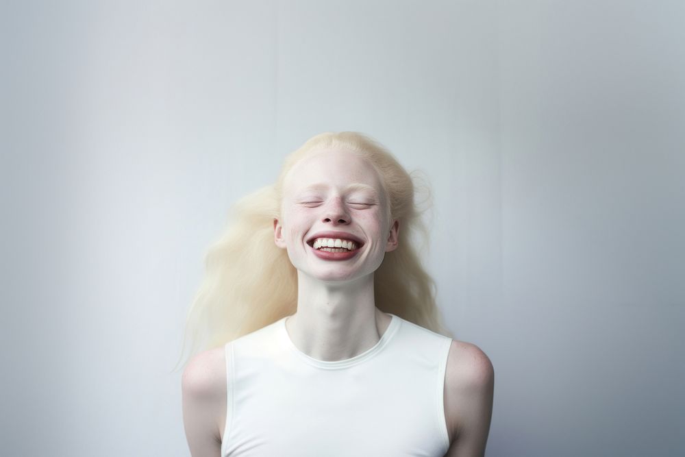 Albinism woman laughing adult white. AI generated Image by rawpixel.
