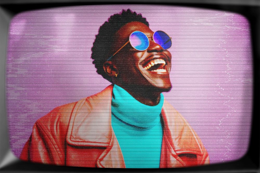 Happy African man with old TV effect