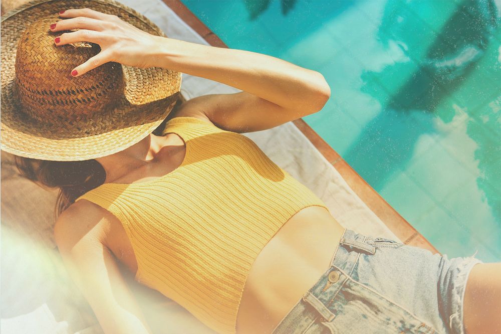 Woman enjoy Summer sunbathing, sunlight flare
