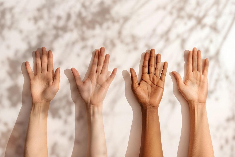 Diverse hands, flower shadow