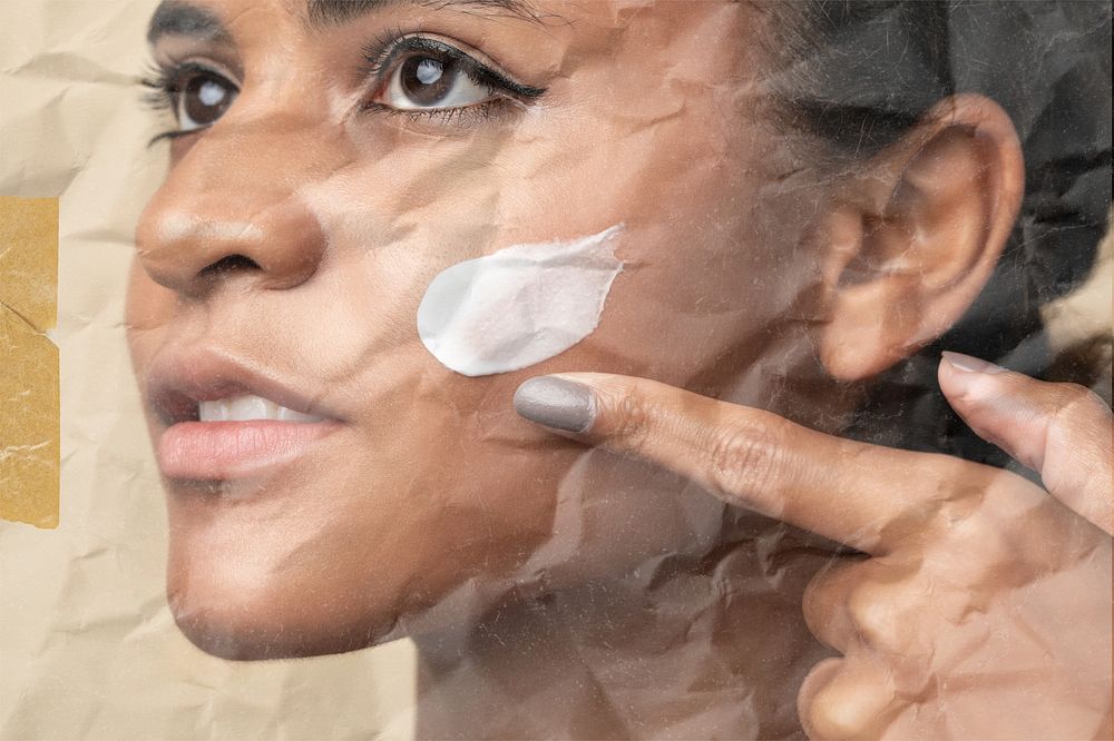 Woman applying skincare  with crumpled paper effect