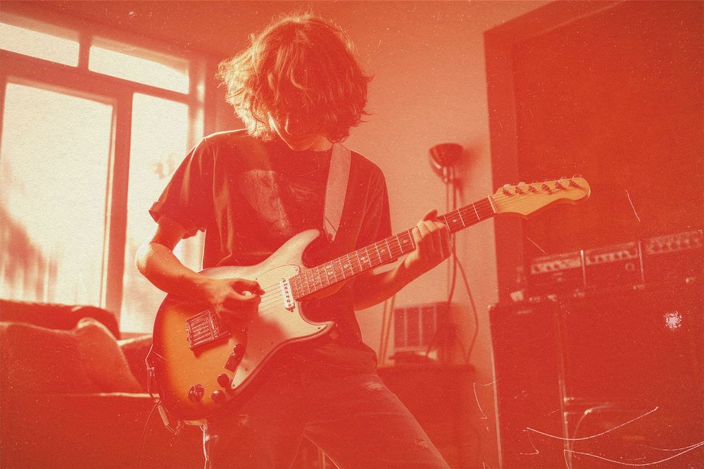 Guitarist musician with red risograph effect
