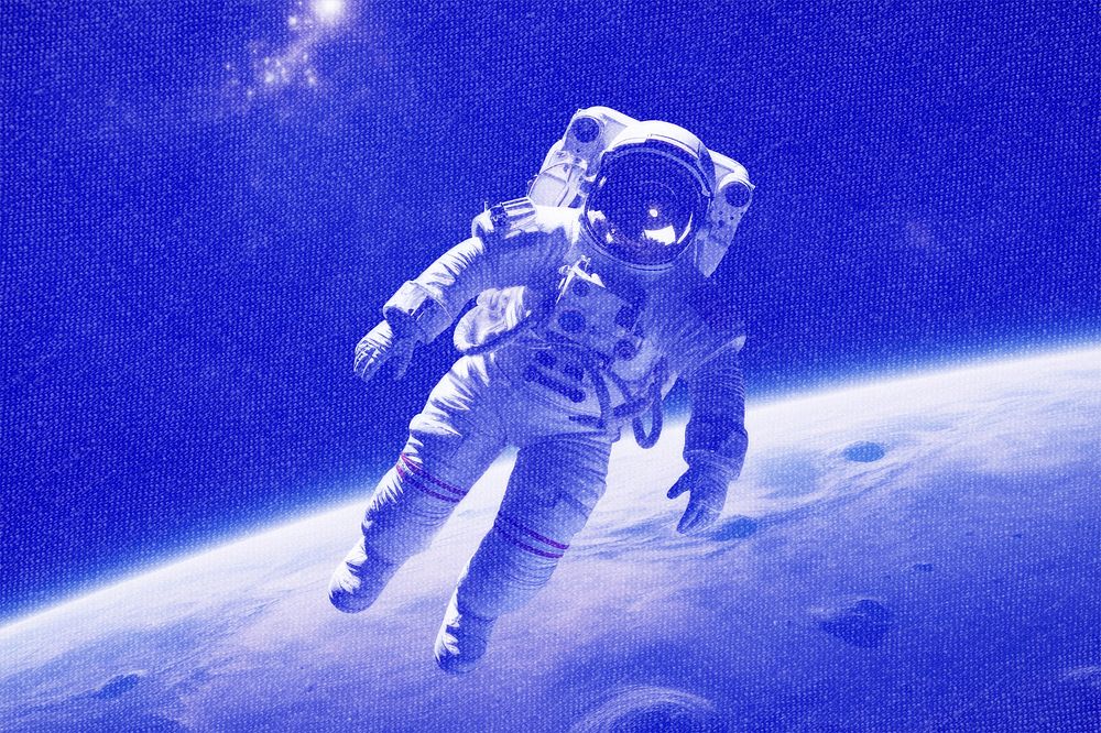 Floating astronaut with blue risograph effect