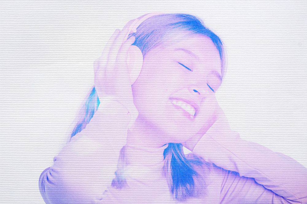 Woman listening to music  image with digital effect