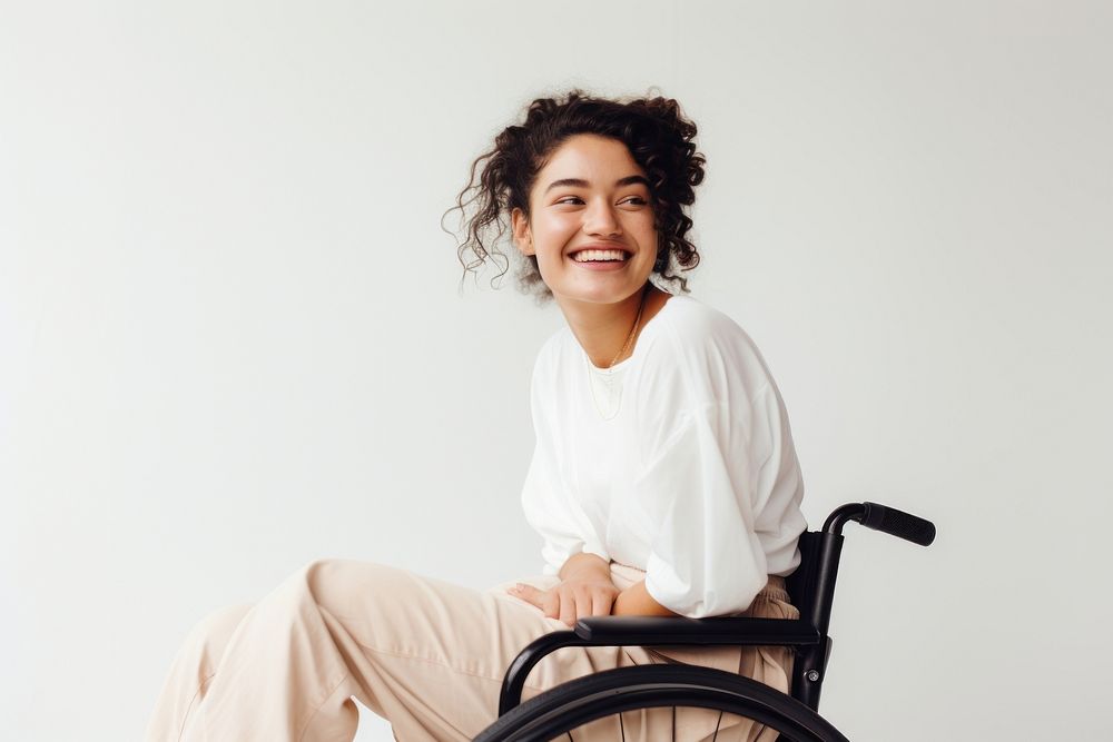 A disabled woman wheelchair smiling smile. AI generated Image by rawpixel.