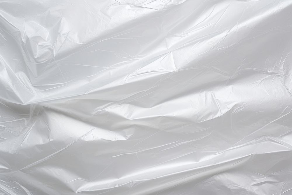 Plastic wrap texture white backgrounds crumpled. AI generated Image by rawpixel.