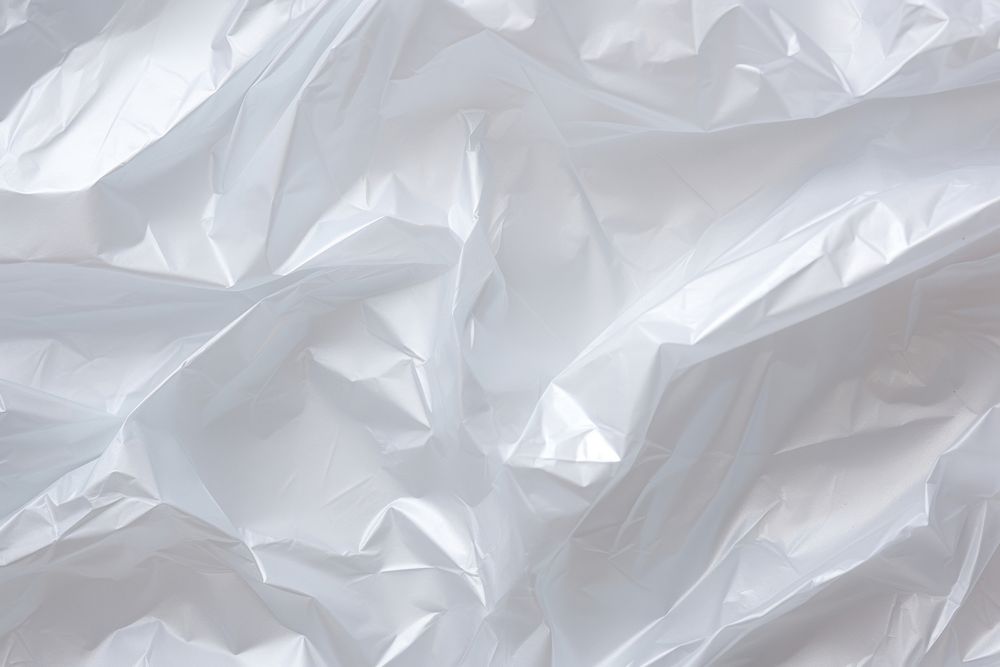 Plastic wrap texture backgrounds paper white. AI generated Image by rawpixel.