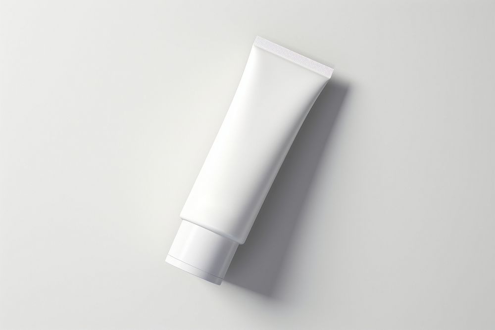 White background toothpaste cosmetics weaponry. 