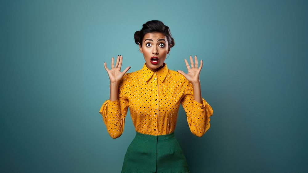 An polkadot style clothing Indian adult gesturing surprised. AI generated Image by rawpixel.