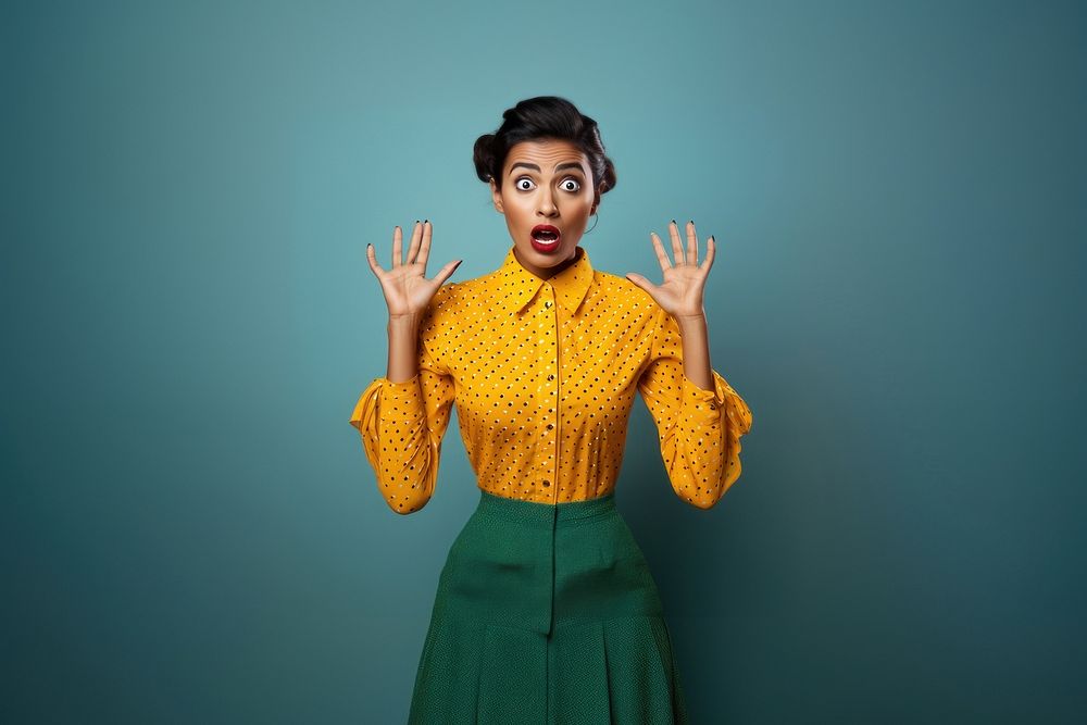 An polkadot style clothing Indian adult gesturing surprised. AI generated Image by rawpixel.
