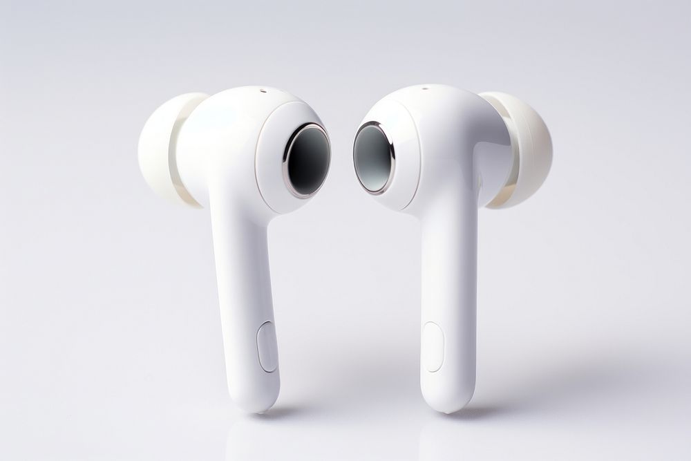 A White headphones wireless earpieces white white background electronics. AI generated Image by rawpixel.