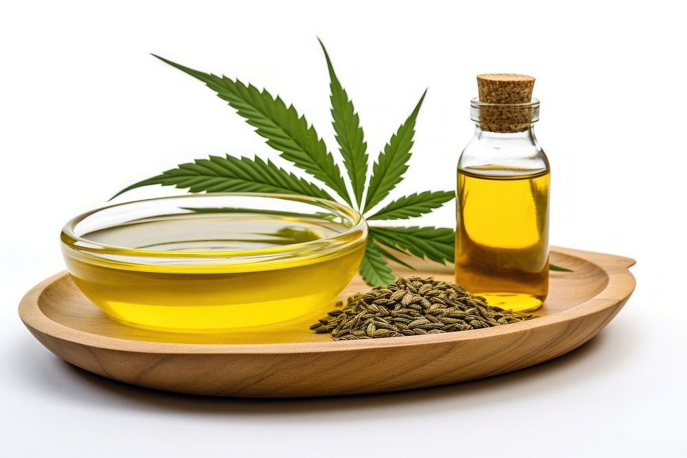 Hemp oil leaf seed white background. 