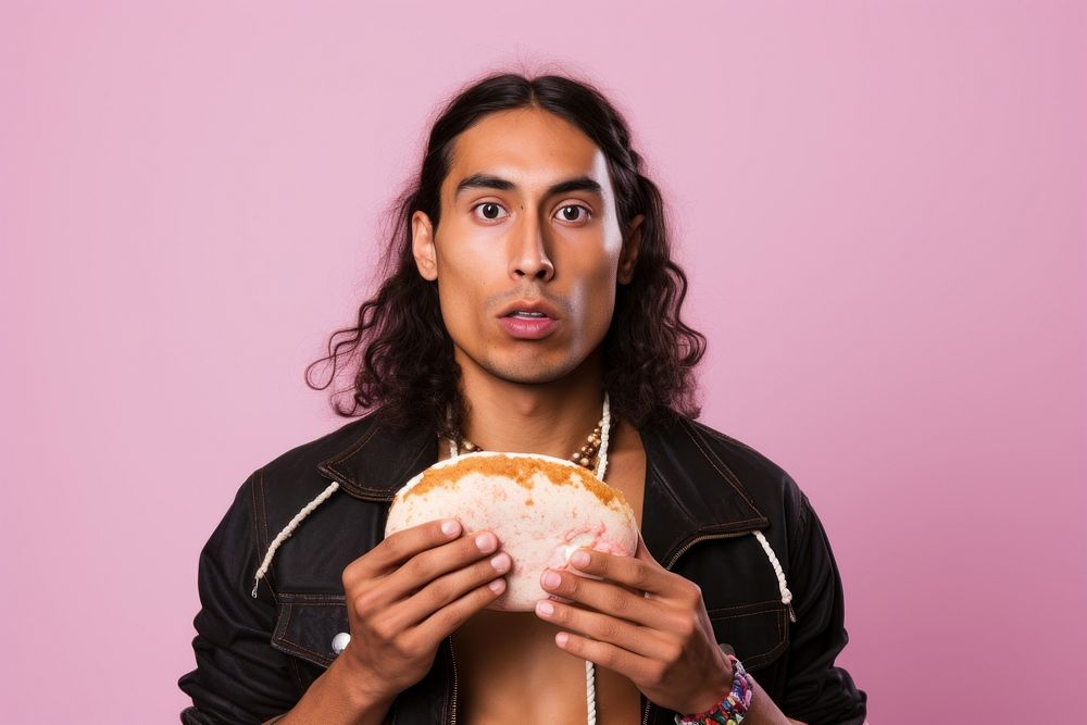 Hamburger holding eating adult. AI generated Image by rawpixel.