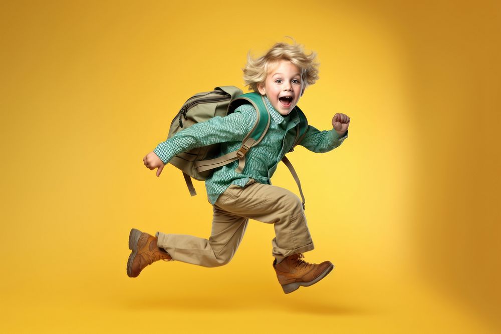 Jumping backpack portrait child. 