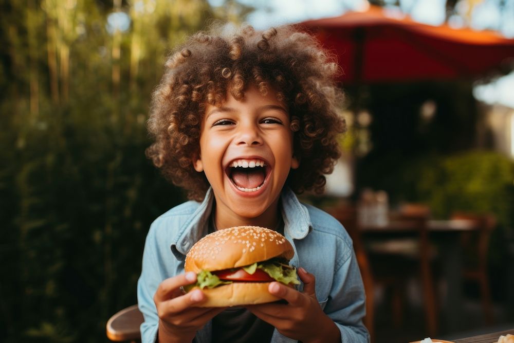 Eating laughing outdoors burger. AI generated Image by rawpixel.