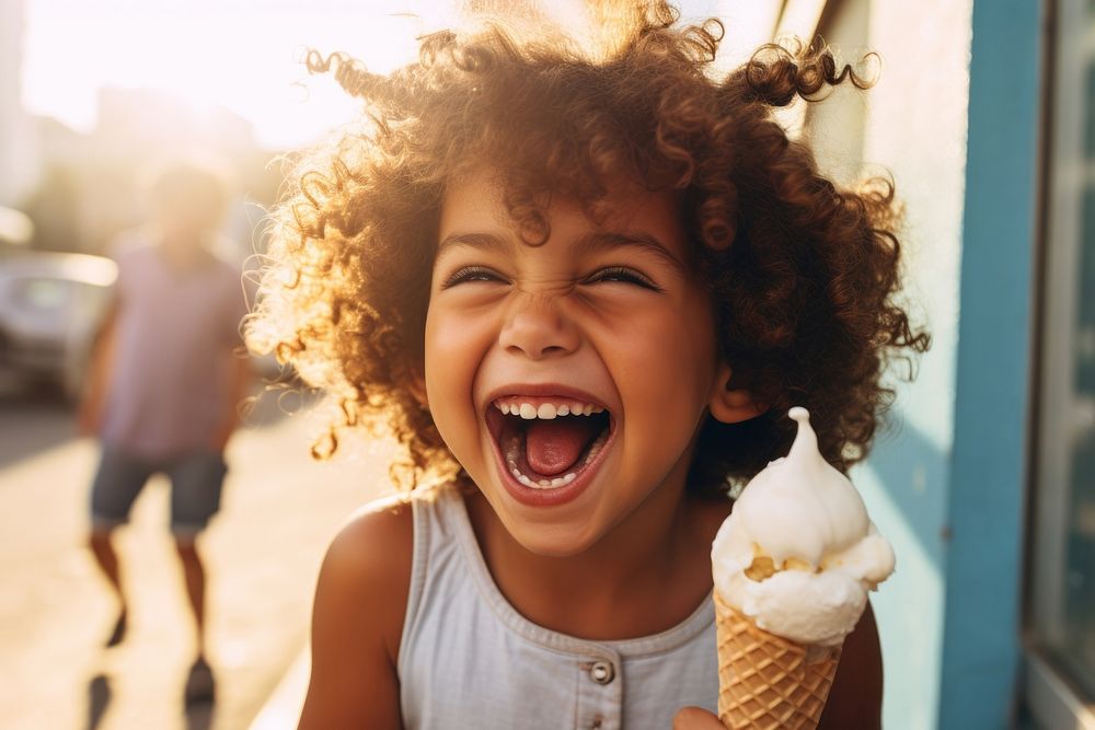 Girl laughing holding dessert. 