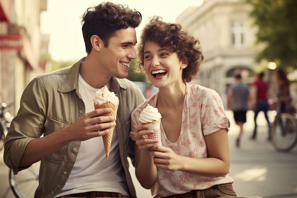 Eating adult laughing outdoors. 