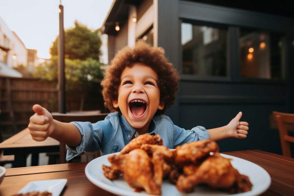 Eating outdoors happy fried chicken. 