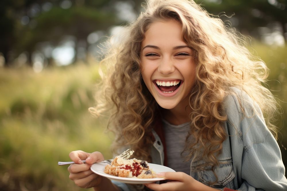 Eating laughing outdoors happy. AI generated Image by rawpixel.