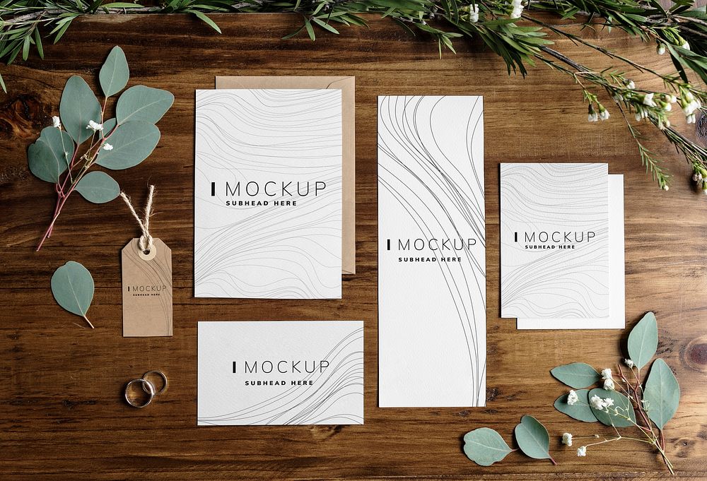 Business stationary design mockups on a wooden table