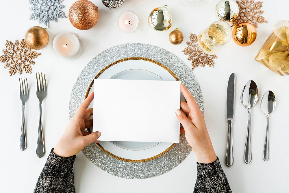 Blank card on a holiday table setting