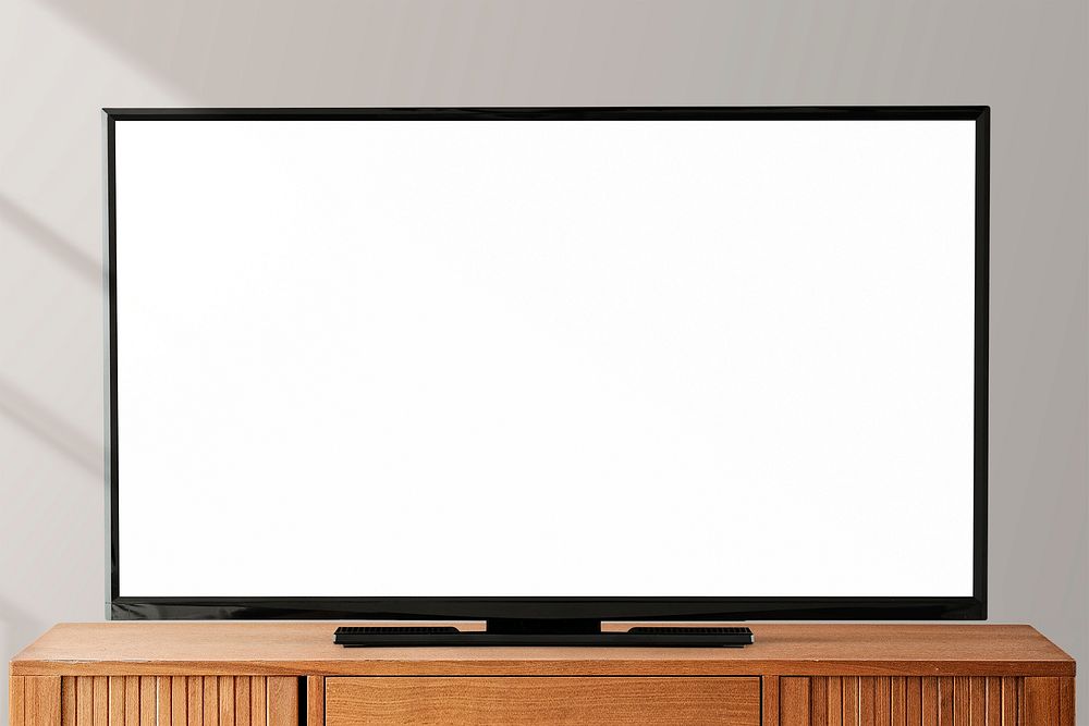 Smart TV screen mockup psd on a wooden table