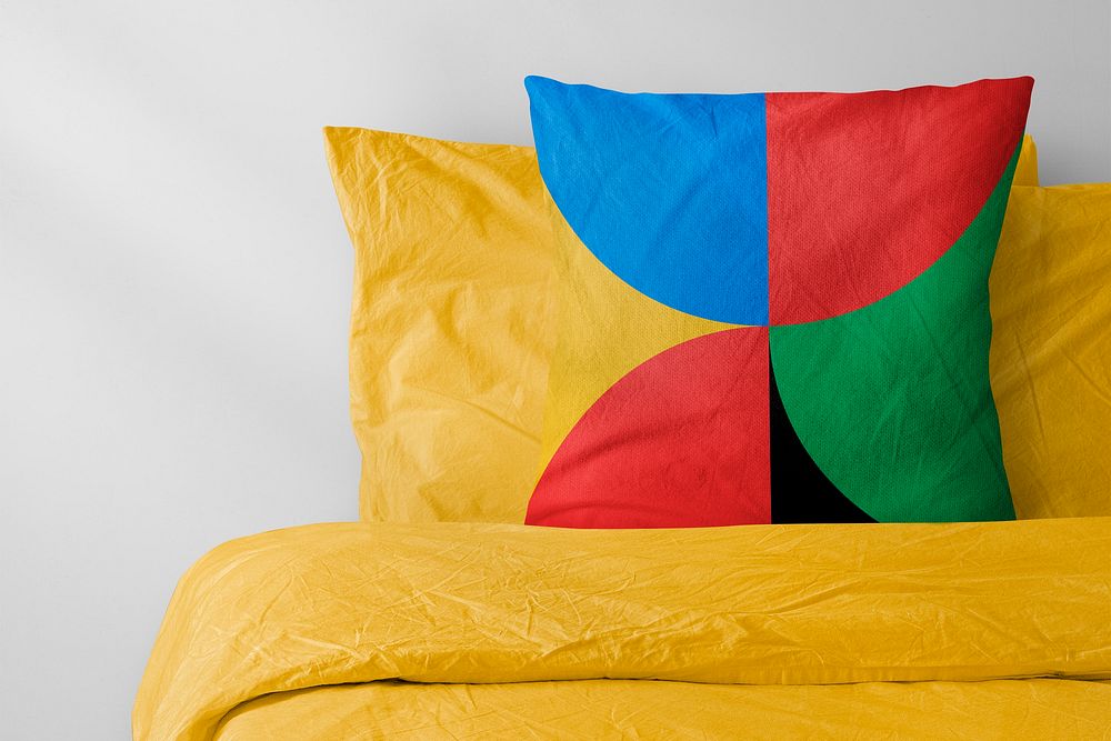 Colorful cushion with yellow bed