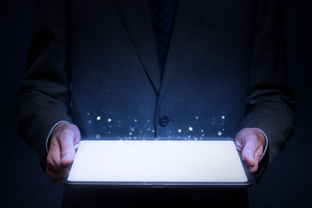 Businessman holding tablet, digital remix