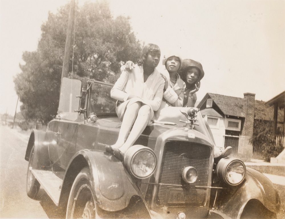  Three Women on Hood of Automobile