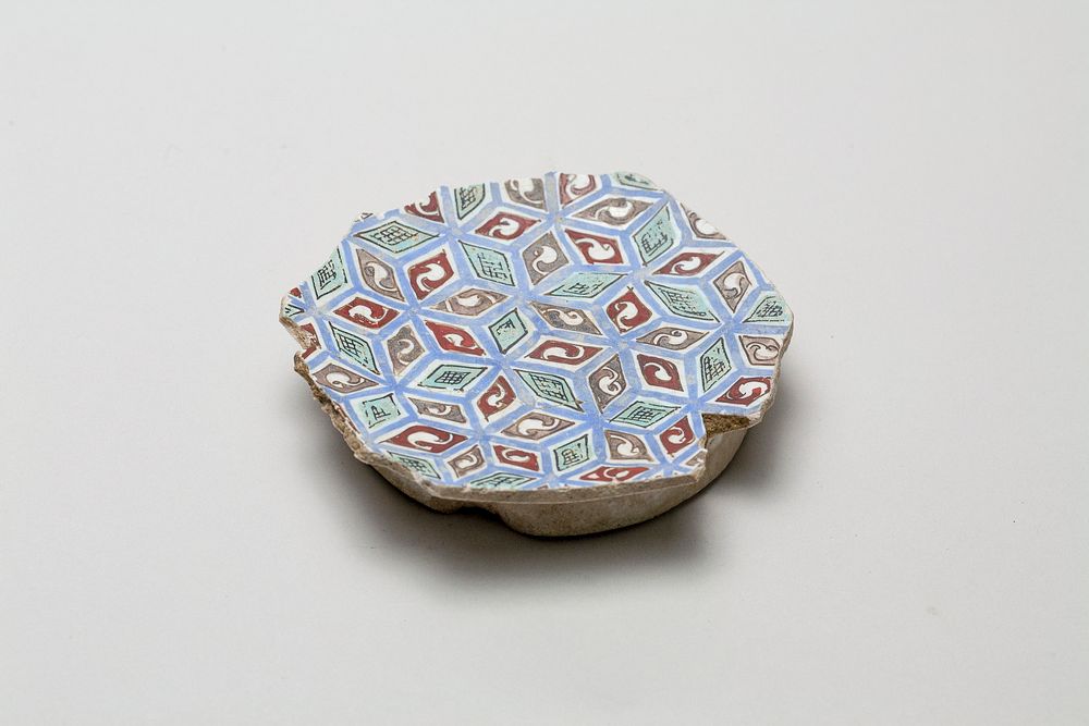 Fragmentary base of a bowl with with abstracted all-over design