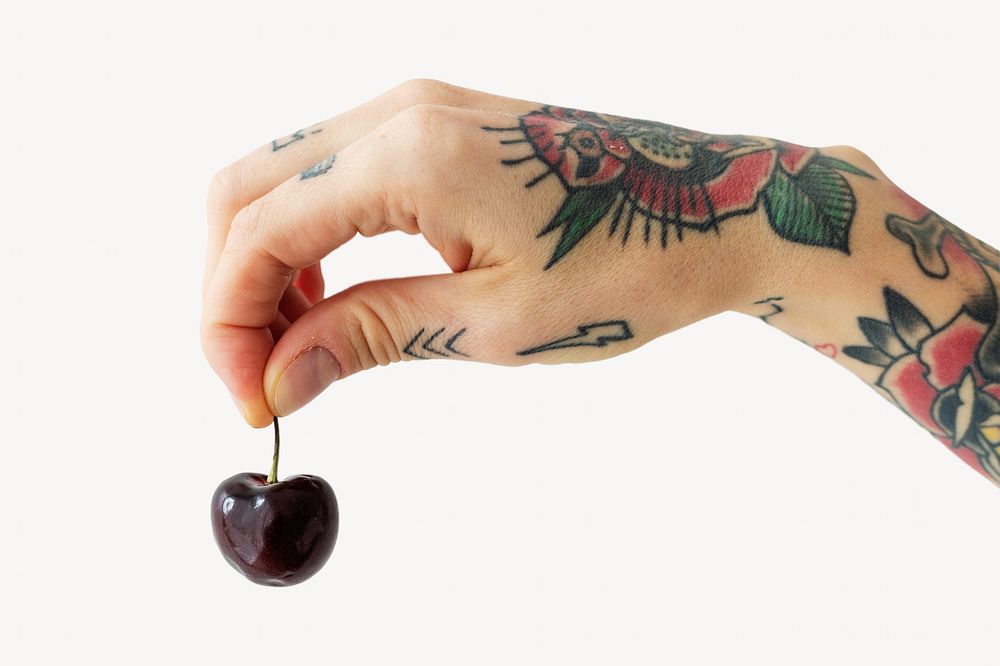 Hand holding cherry isolated design