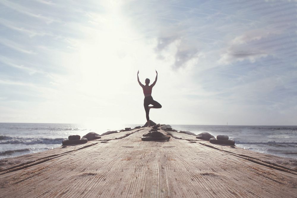 Yoga by sea image with copy space