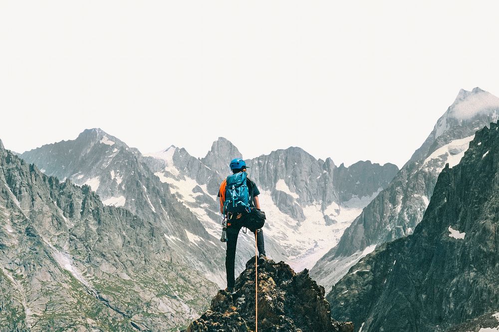 Backpacker at  Chamonix Alps summit in France image element 