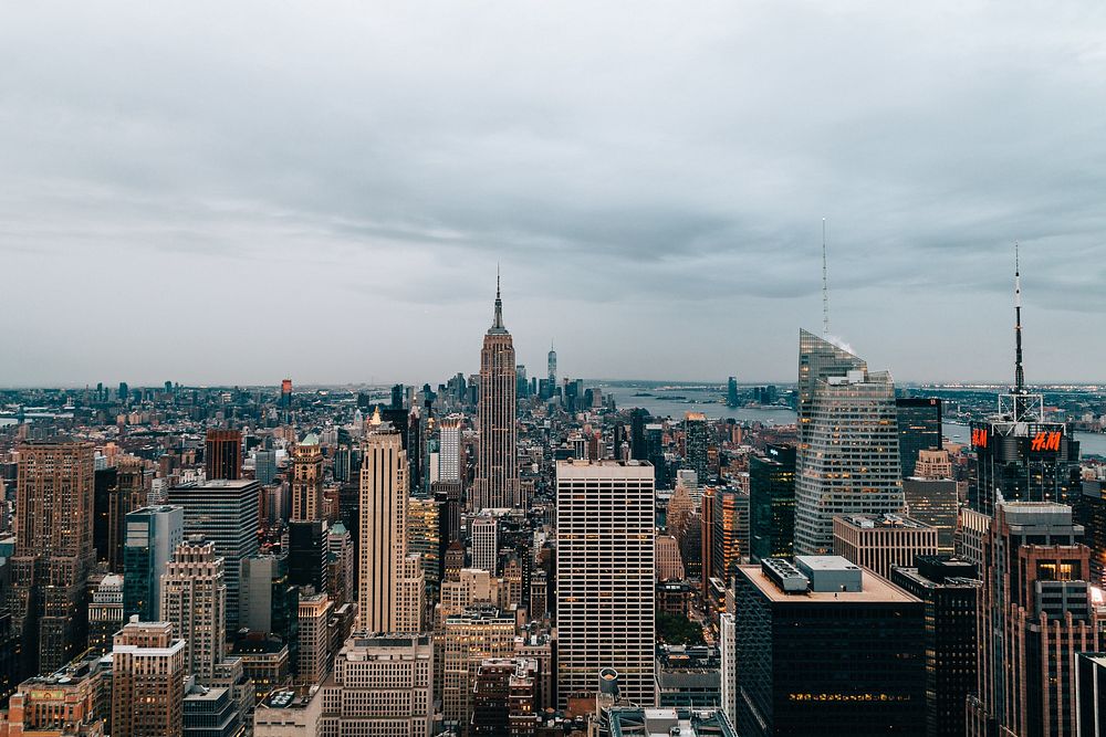 Dusk view of Manhattan's skyline. Many skyscrapers, including the Empire State Building, can be seen from this elevated…