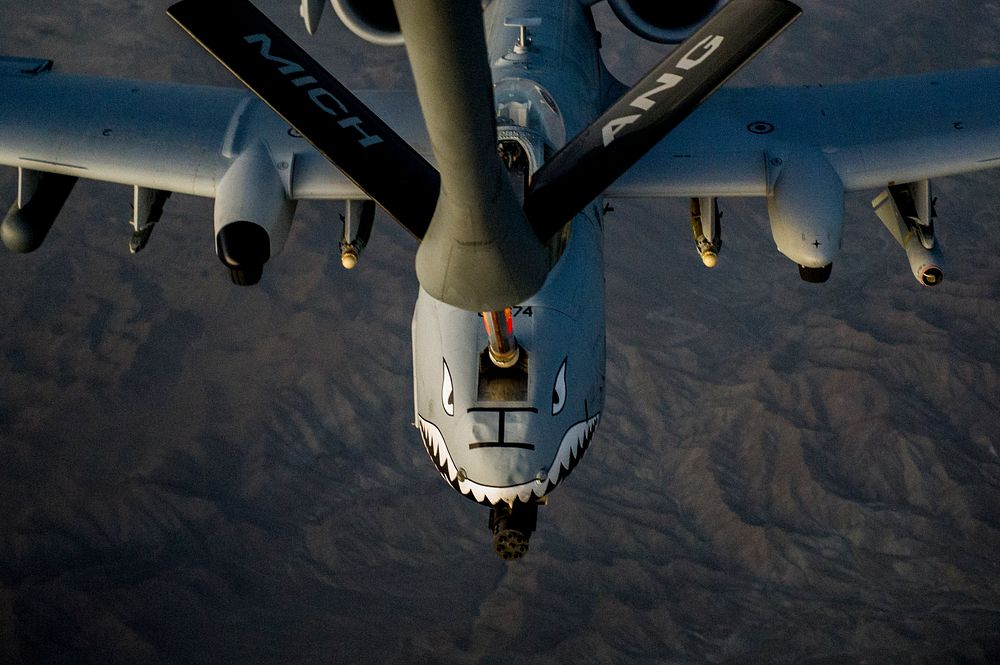 A U.S. Air Force A-10C Thunderbolt II aircraft assigned to the 74th Expeditionary Fighter Squadron receives fuel from a KC…