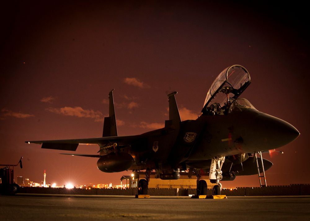 A U.S. Air Force F-15E Strike Eagle aircraft assigned to the 391st Fighter Squadron sits on a flight line at Nellis Air…