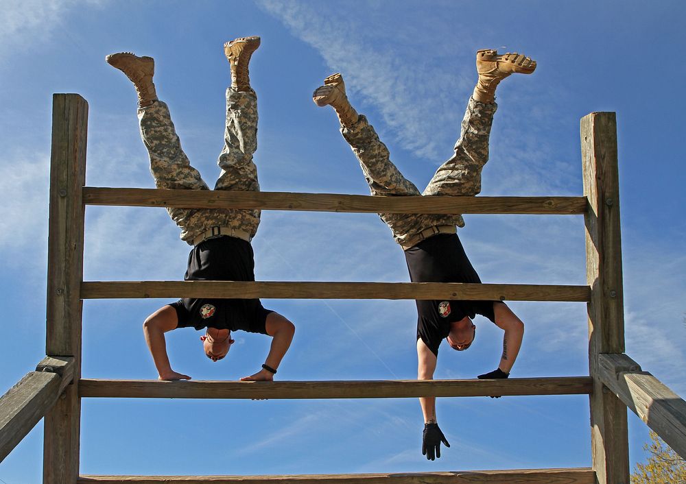 U.S. Soldiers, with the 3rd Squadron, 1st Cavalry Regiment descend an obstacle during a confidence course at Fort Benning…