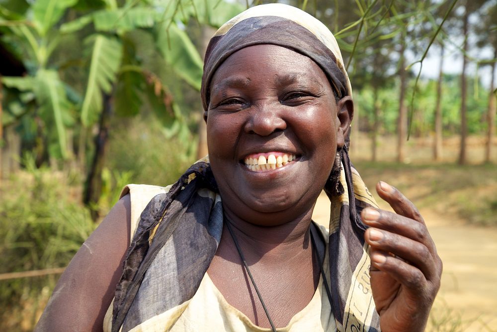 Happy African woman. Credit: Brant Stewart, RTI. Original public domain image from Flickr
