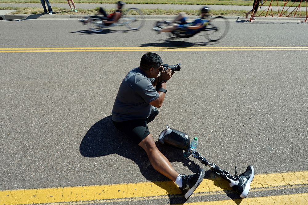 U.S. Army Staff Sgt. Roy Rodriguez, with the Special Operations Command team, photographs recumbent cyclists during the 2014…