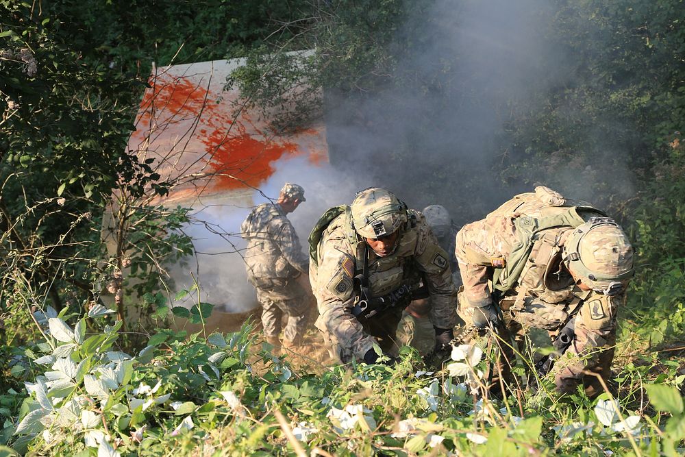 U.S. Soldiers of Alpha Company, 173rd Brigade Support Battalion, 173rd Airborne Brigade Combat Team, recover a crashed…