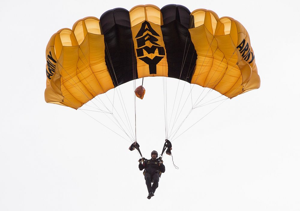 A U.S. Army Special Operations Forces parachute team member descends toward Luzon Drop Zone during the 18th Annual Randy…