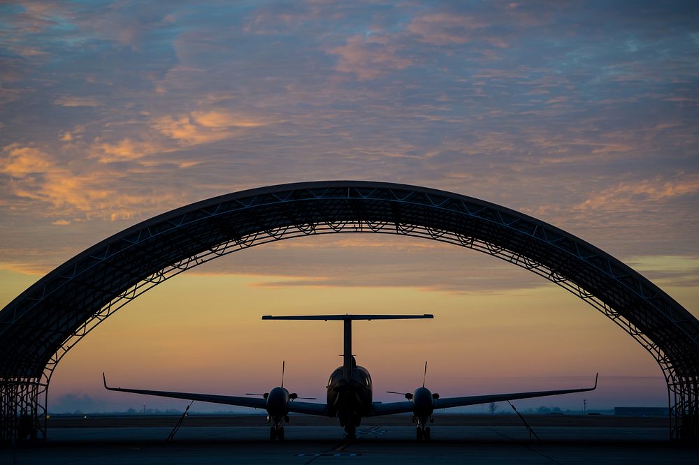 A U.S. Air Force MC-12W aircraft assigned to the 137th Special Operations Wing awaits a preflight inspection at Will Rogers…