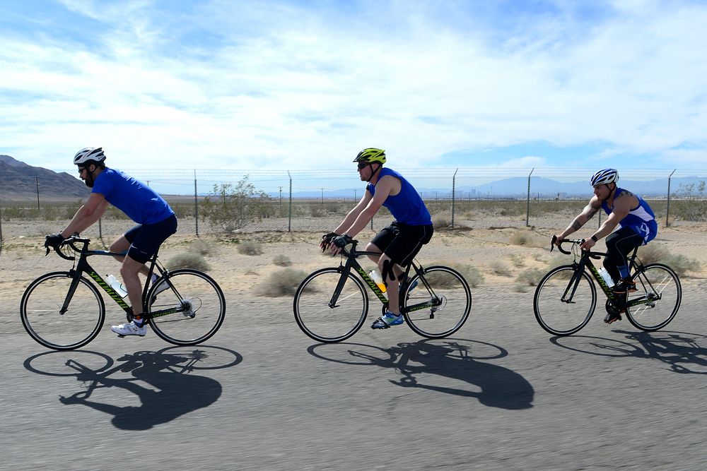 Air Force Trials cycling competitors ride towards the finish line during the 2016 Air Force Trials at Nellis Air Force Base…