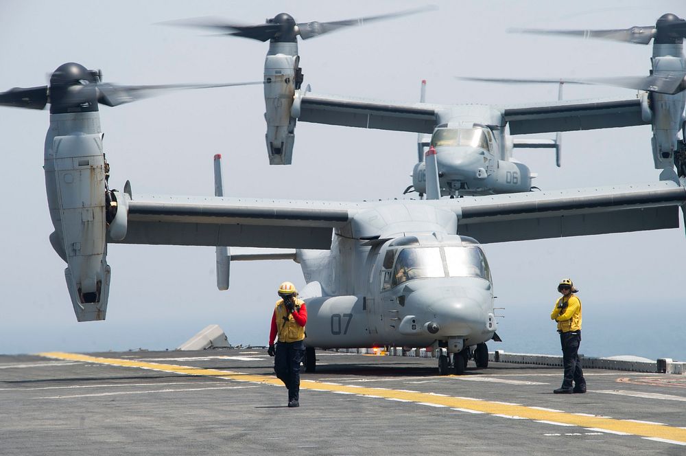 A U.S. Marine Corps MV-22 Osprey tiltrotor aircraft, attached to the 13th Marine Expeditionary Unit (MEU), prepares to land…