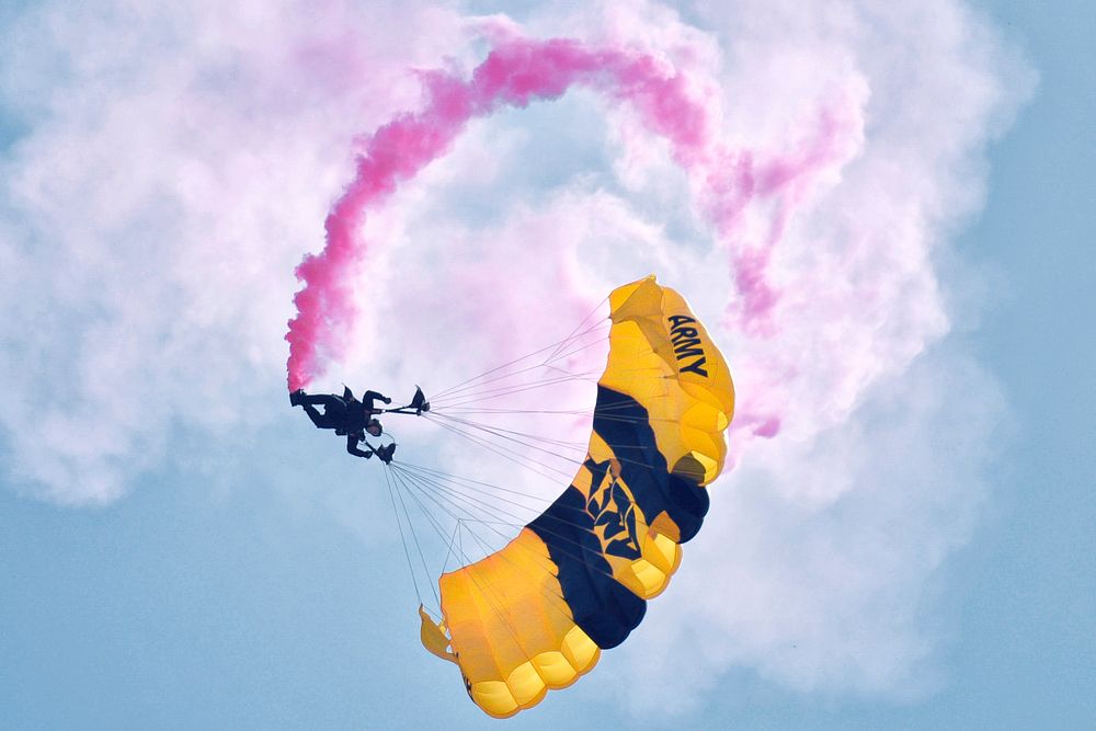 A member of the U.S. Army Golden Knights parachutes towards the ground during the 2016 Friendship Day at Marine Corps Air…