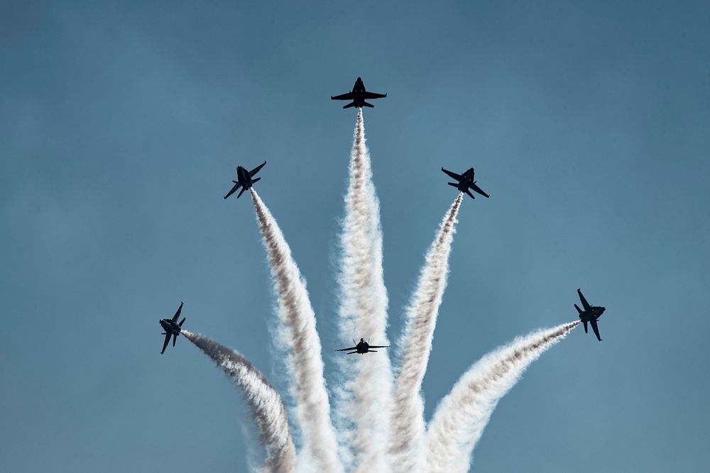 F-18 Hornets, with the Navy's Flight Demonstration Team "The Blue Angels," perform an aerial demonstration during Air Show…
