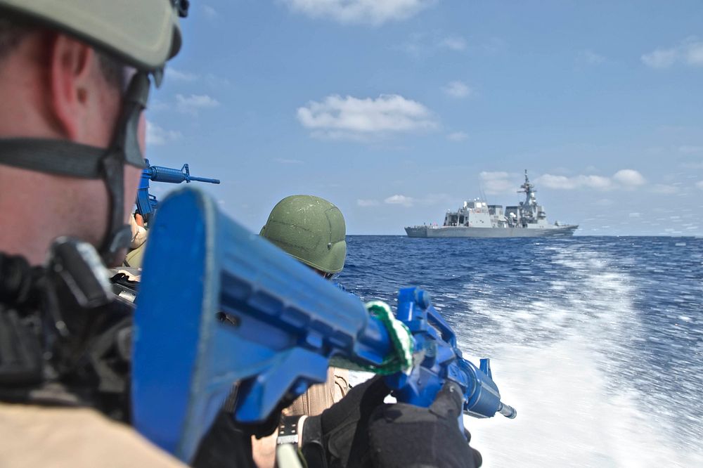 The visit, board, search and seizure (VBSS) team, attached to the guided-missile destroyer USS Decatur (DDG 73), conduct…