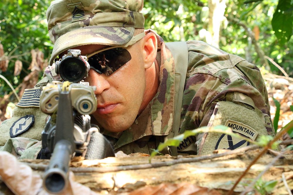 A U.S. Soldier pulls security in the jungle during an exercise at Jungle Warfare School at Achiase Military Base, Akim…