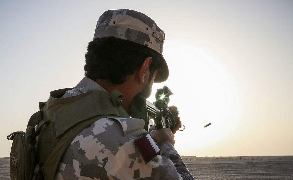 A Qatari soldier engages a simulated target with an M4 carbine during bunker clearing training with U.S. Army Soldiers…
